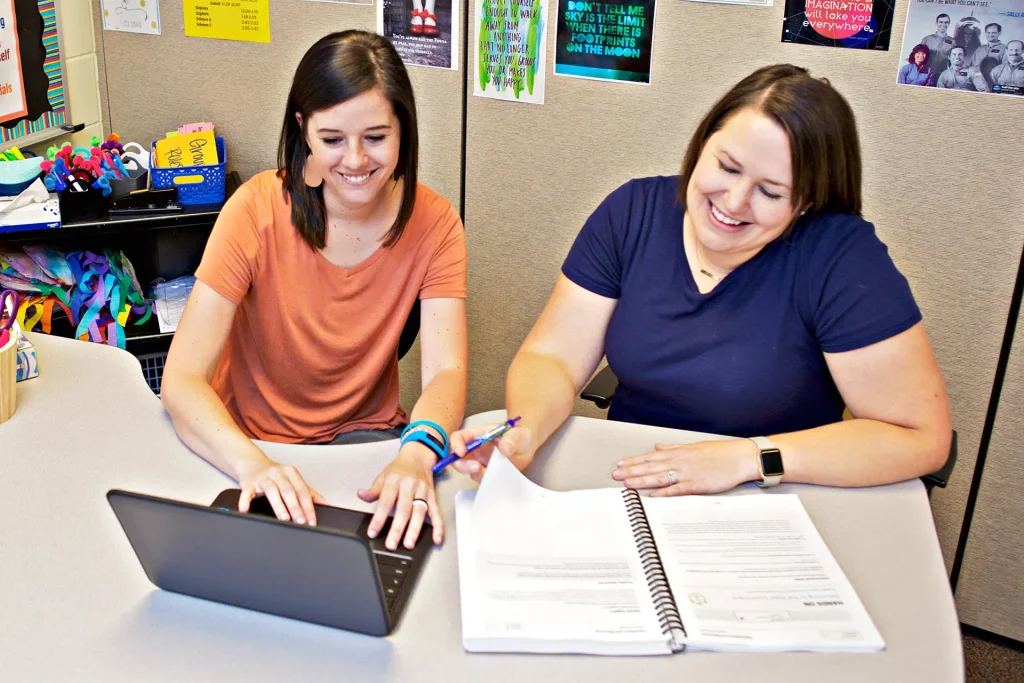 Contact us image of two women and computer