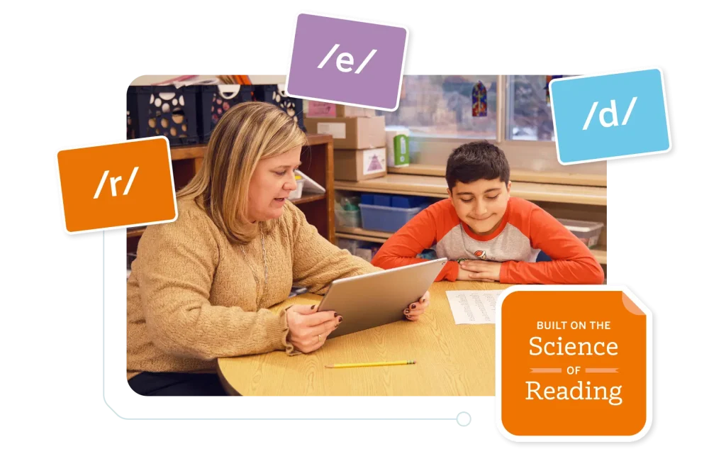 A teacher and a student sit at a table working on a tablet, surrounded by labels with phonetic symbols and a text that says "Built on the Science of Reading.