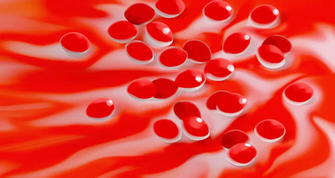 Cápsulas rojas y blancas esparcidas sobre un vibrante fondo rojo y blanco.