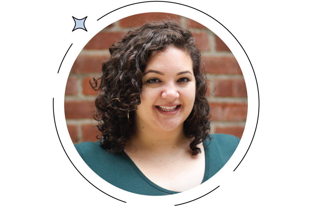 Person with curly hair smiling, standing in front of a brick wall. Circular frame with decorative star in the corner.