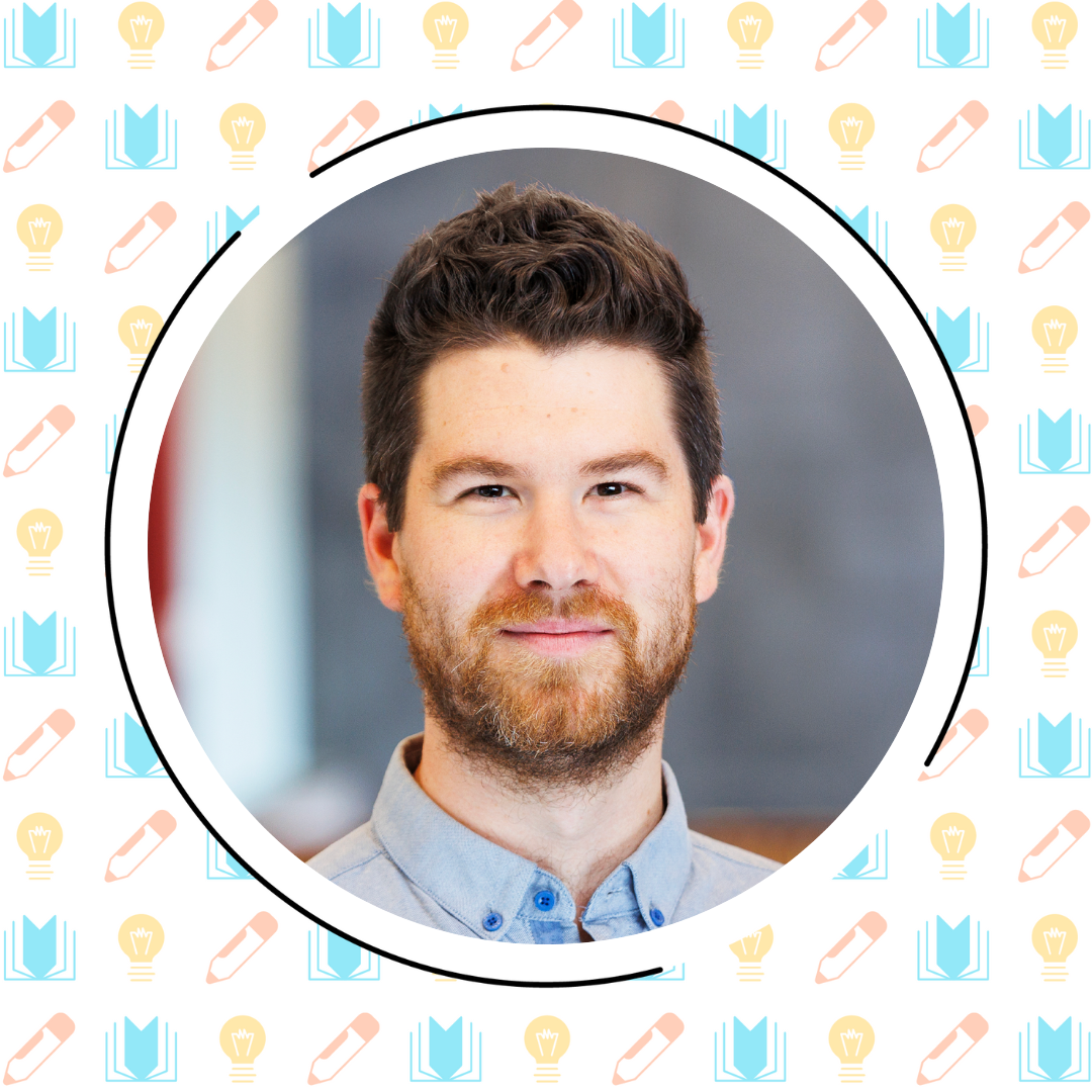 A bearded man with short brown hair smiles slightly, wearing a light blue collared shirt. The background features icons of books, pencils, and lightbulbs.