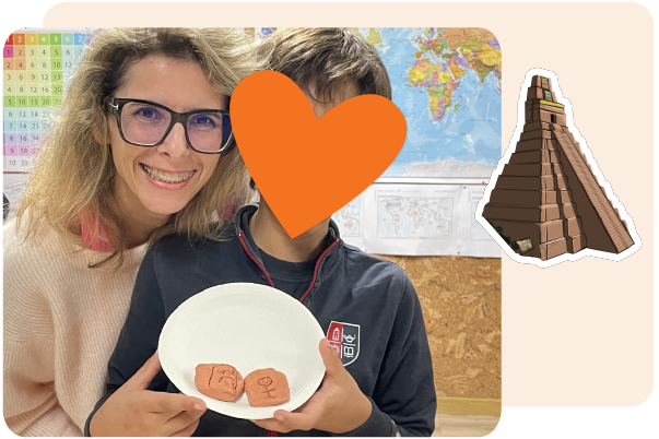 A woman and a child, whose face is covered by a heart graphic, hold a plate with clay pieces featuring carved symbols—perfect for resources for teachers. A pyramid illustration appears on the right.