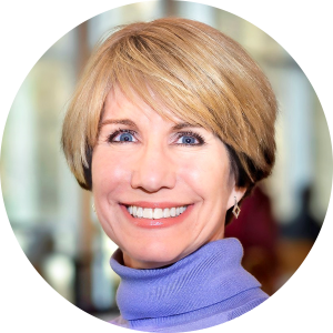 A woman with short blonde hair, wearing a purple turtleneck and earrings, smiles at the camera with a blurred background—perfect for an educational podcast cover.